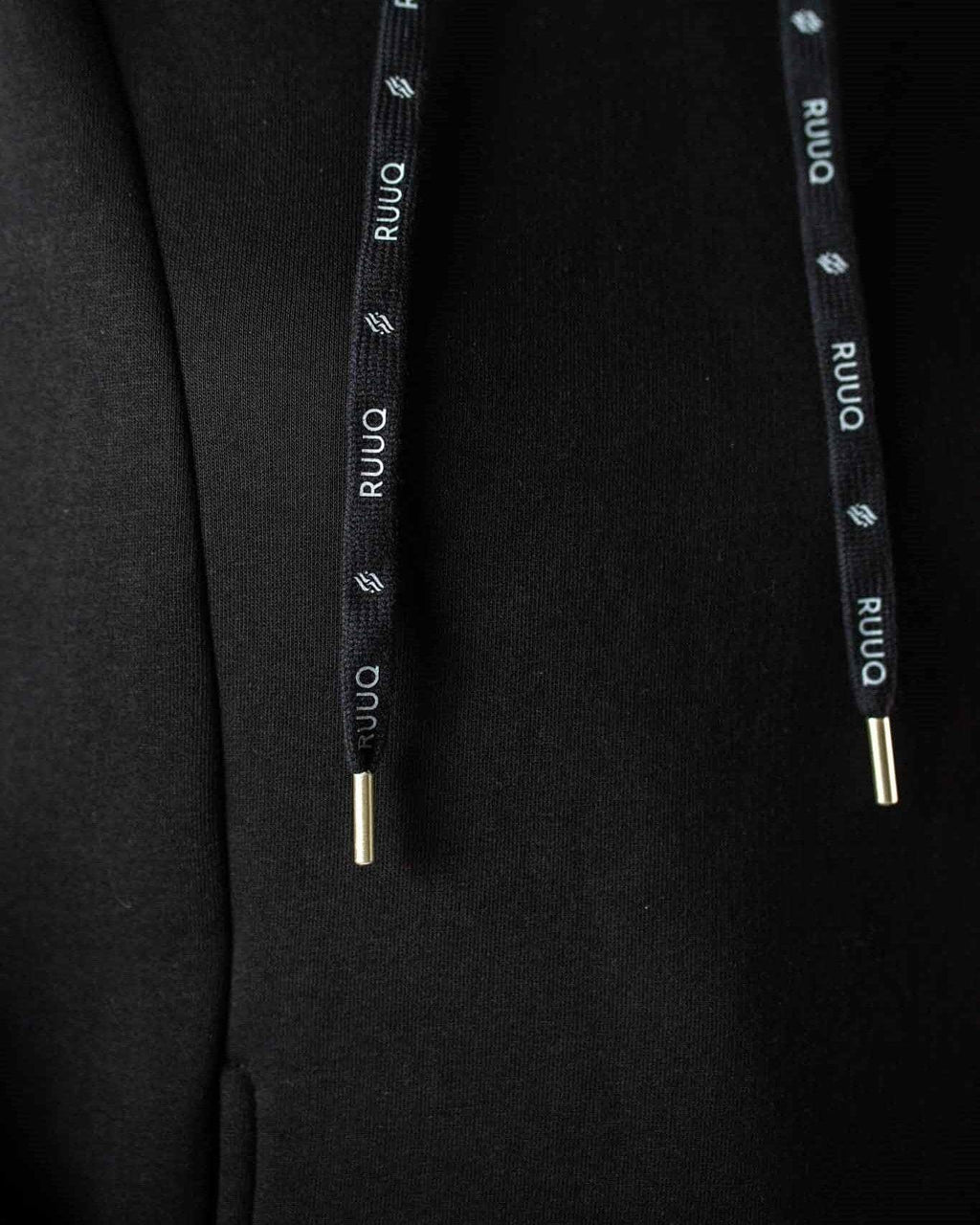 Le sweat à capuche oversize en molleton