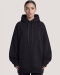 Le sweat à capuche oversize en molleton